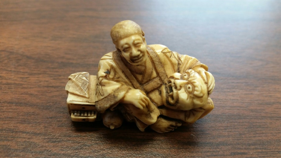 caption: One of the ivory figurines that could land an Everett man behind bars.