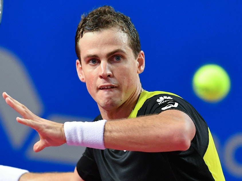 caption: Canada's Vasek Pospisil is a co-founder of the Professional Tennis Players Association, a players advocacy group. He says problems with tennis balls used on tour are linked to wrist, elbow and shoulder injuries among players.