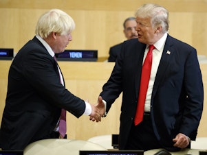 caption: President Trump shakes hands with Boris Johnson during the U.N. General Assembly in 2017. The United Kingdom and the United States are about to be led by two remarkably similar figures.