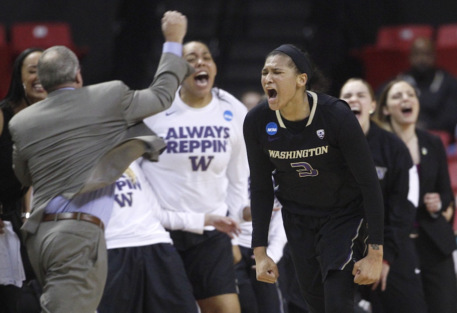 caption: Washington forward Talia Walton reacts after hitting a three-pointer in the second half of an NCAA college basketball game against Maryland in the second round of the NCAA tournament, Monday, March 21, 2016.