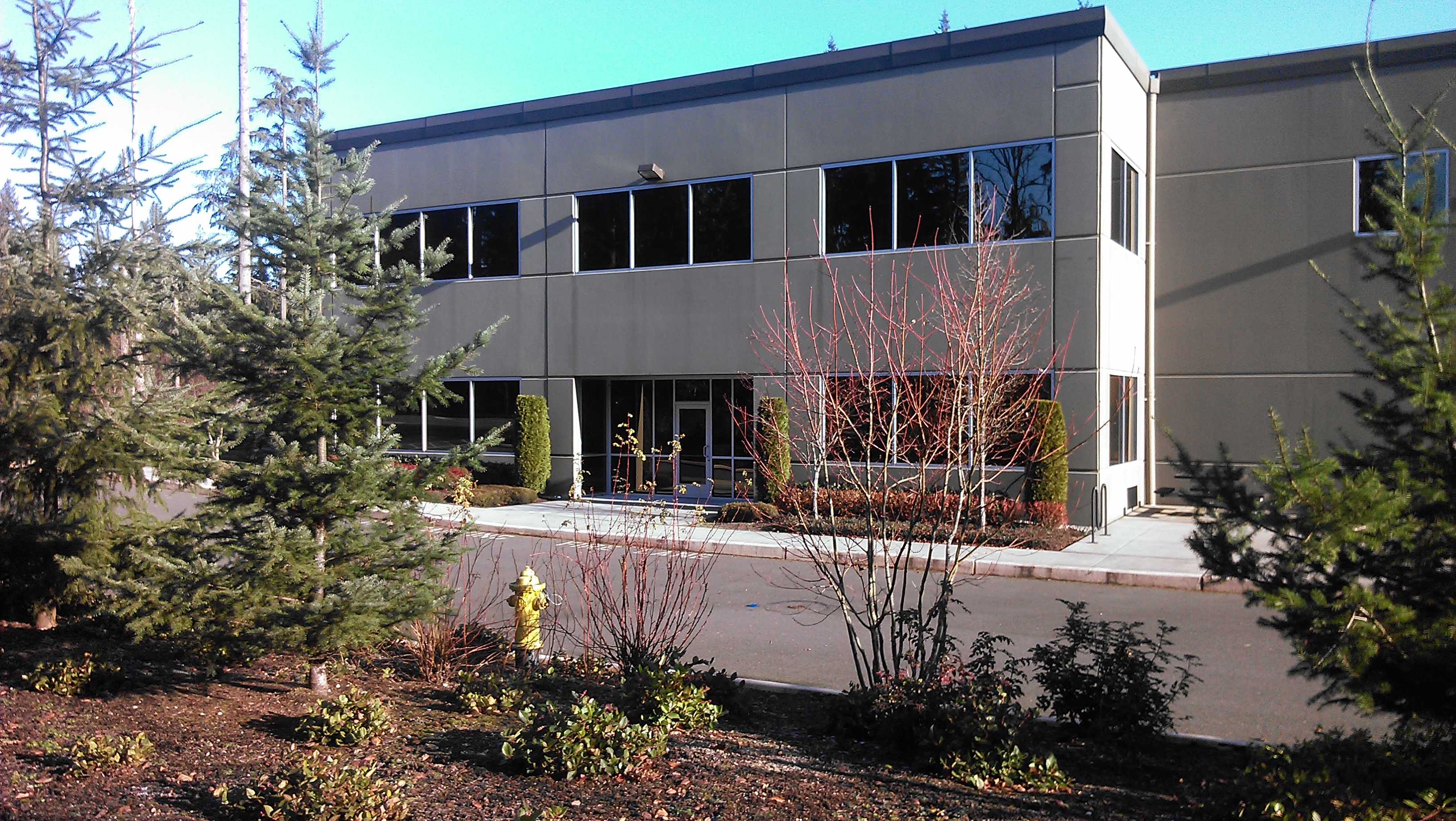 caption: The site of a proposed marijuana growing and processing facility in Redmond Ridge.