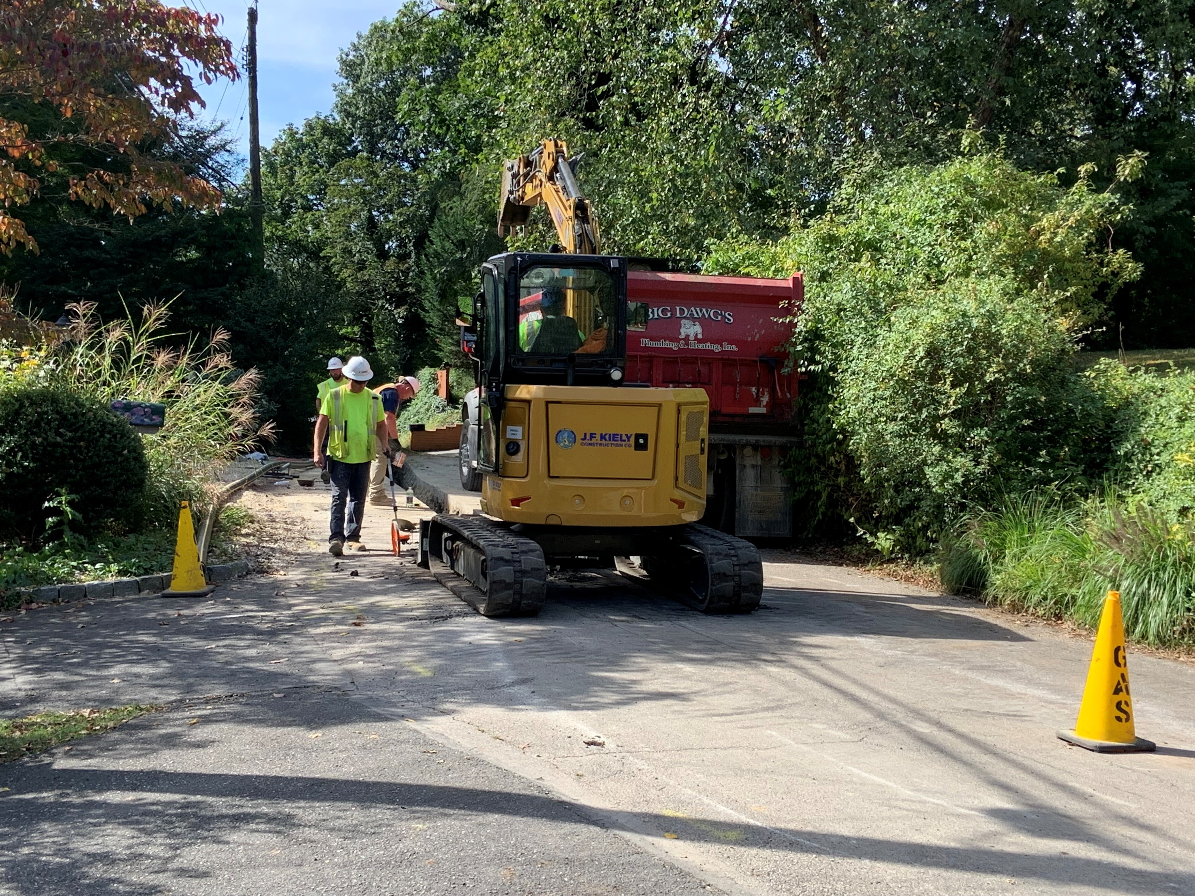 caption: A gas pipeline construction crew in Wyncote, Pa., replaces older pipes that are prone to leaking climate-heating methane. Projects like this are increasing gas customers' bills, even as wholesale gas prices are relatively low.