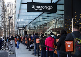 caption: A line forms outside of Amazon Go on Monday, January 22, 2018, on 7th Ave., in Seattle. 