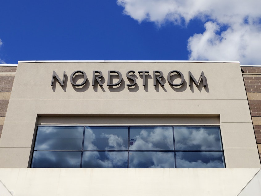 caption: A Nordstrom sign is displayed outside of a mall in 2017 in Indianapolis. Police described an "organized theft" at a Nordstrom near San Francisco.
