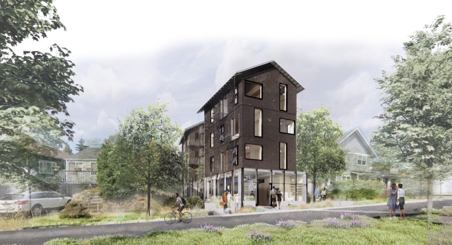 caption: While many projects compromised on density in deference to community feelings, Logan White's project explored a more aggressive approach to density, in order to drive costs down. One benefit the community gets in exchange is the coffee shop on the ground floor of this project, turning the building into a community gathering space.