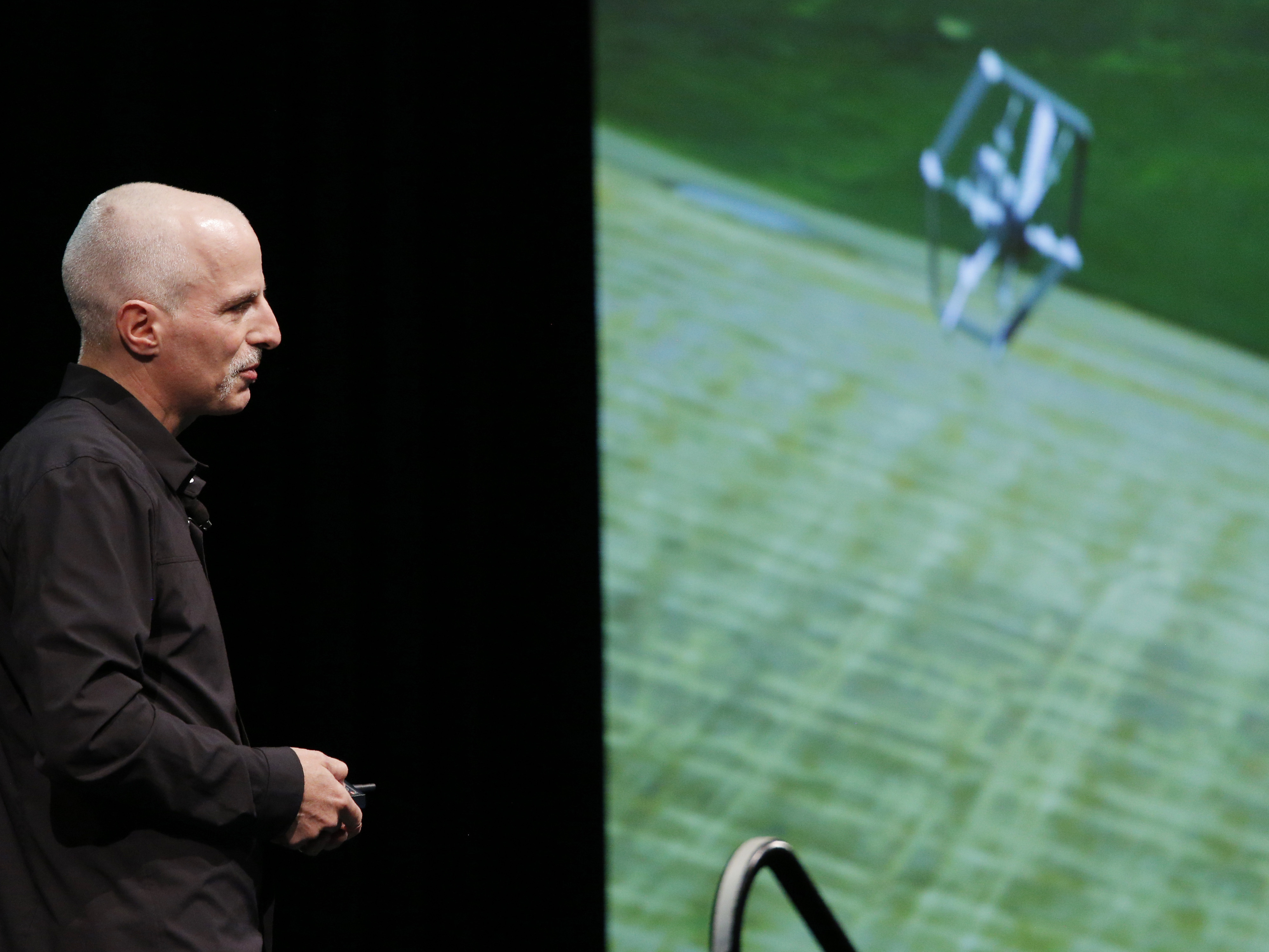 caption: Gur Kimchi, vice president of Prime Air, talks about Amazon's drone delivery service. Federal officials recently approved a patent for the company to explore allowing its drones to provide "home surveillance" for its customers.