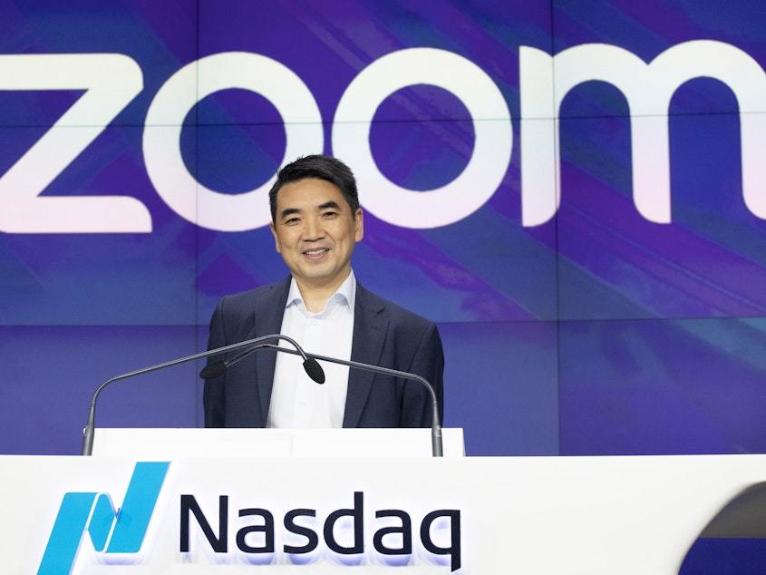 caption: Zoom CEO Eric Yuan attends the opening bell at Nasdaq as his company holds its IPO in New York. The company's seen a massive growth in users amidst the coronavirus pandemic.