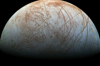 caption: New analysis has found a source of carbon within Europa, Jupiter's moon that is believed to hold massive amounts of liquid water. This view of the moon was created from images taken by NASA's Galileo spacecraft in the late 1990s.