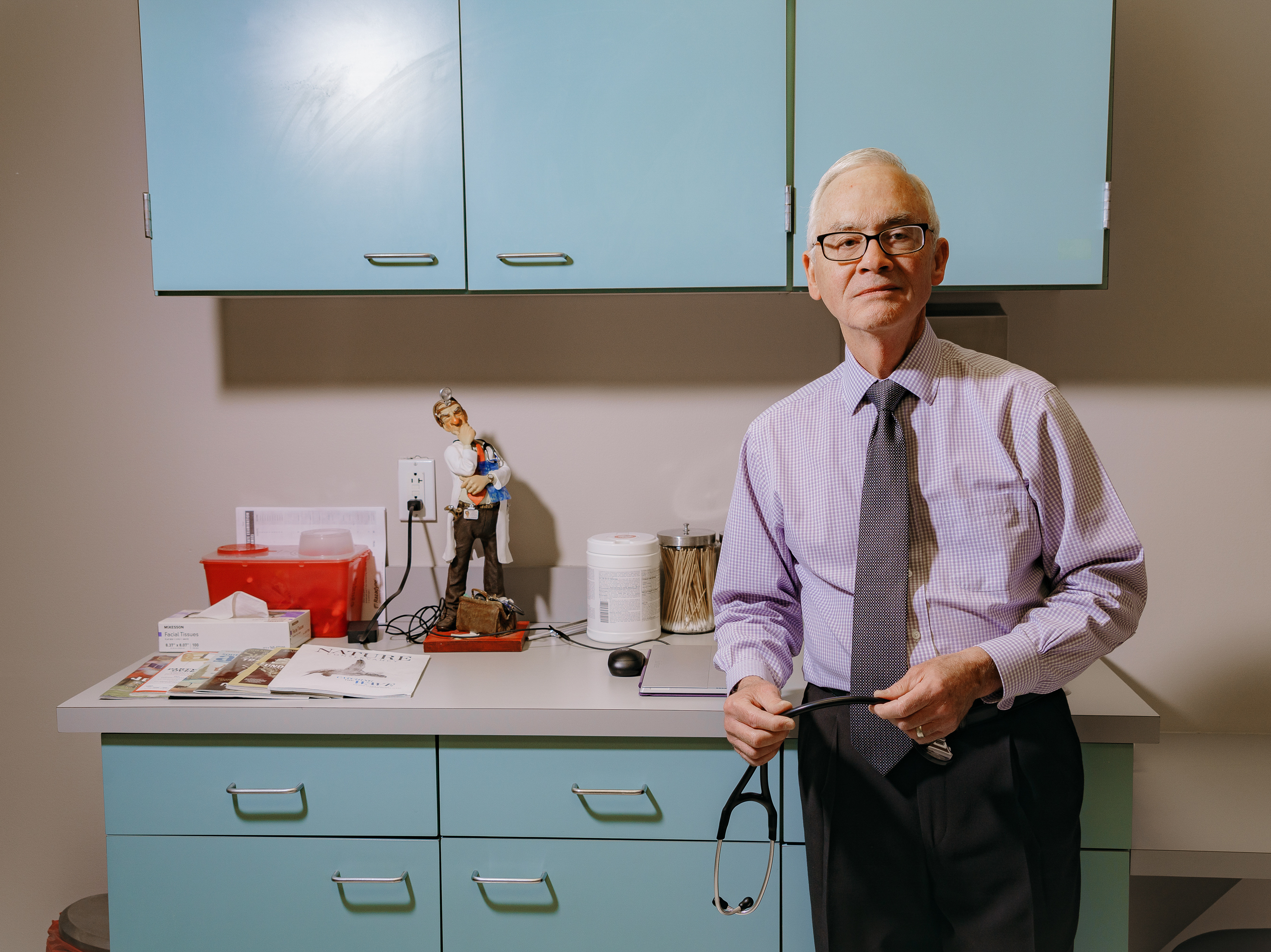 caption: Dr. John Dunlap runs a direct primary care practice in Overland Park, Kan., offering patients direct access to him by phone, and longer appointment times. The model is similar to concierge medicine.