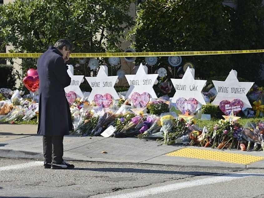 caption: Stars of David memorialize Jewish congregants killed at a synagogue in Pittsburgh on Saturday.