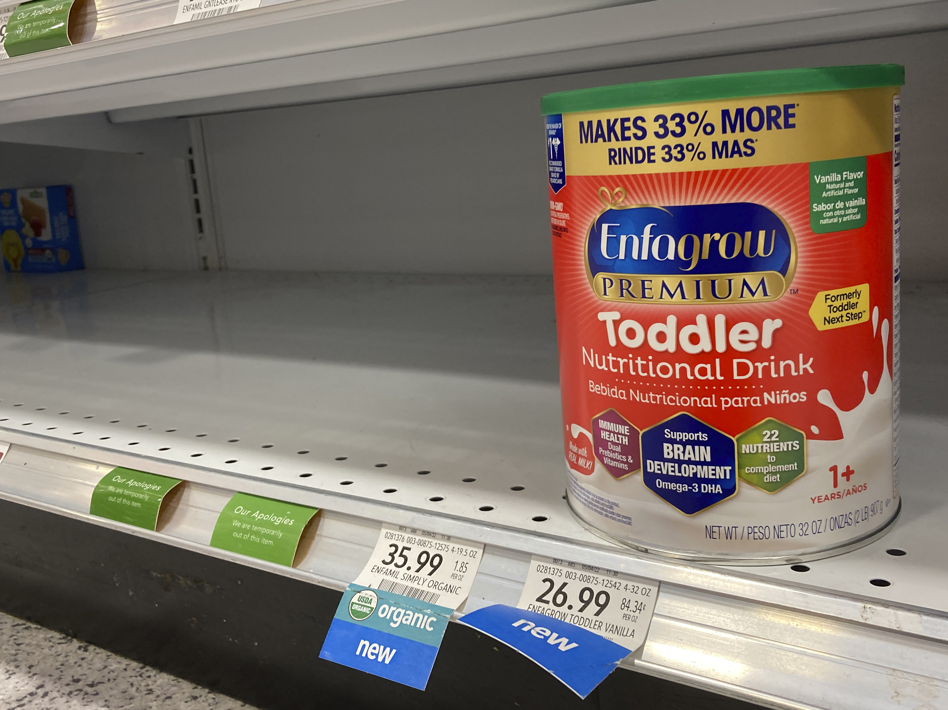 caption: A photo from June 17 shows empty formula shelves at a supermarket in Florida. An internal review found several factors contributed to the national baby formula shortage, but no one person or agency was listed as at fault.