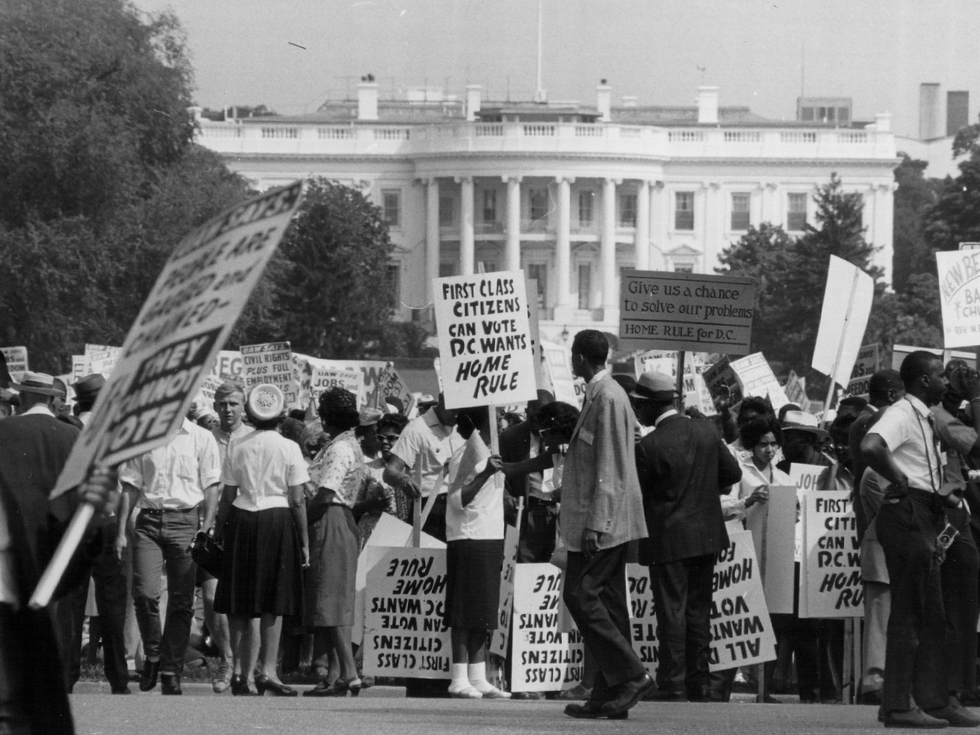 caption: Marchers rally for home rule in front of the White House in April 1965. At that point, D.C. had been run by presidentially appointed commissioners for nearly a century.