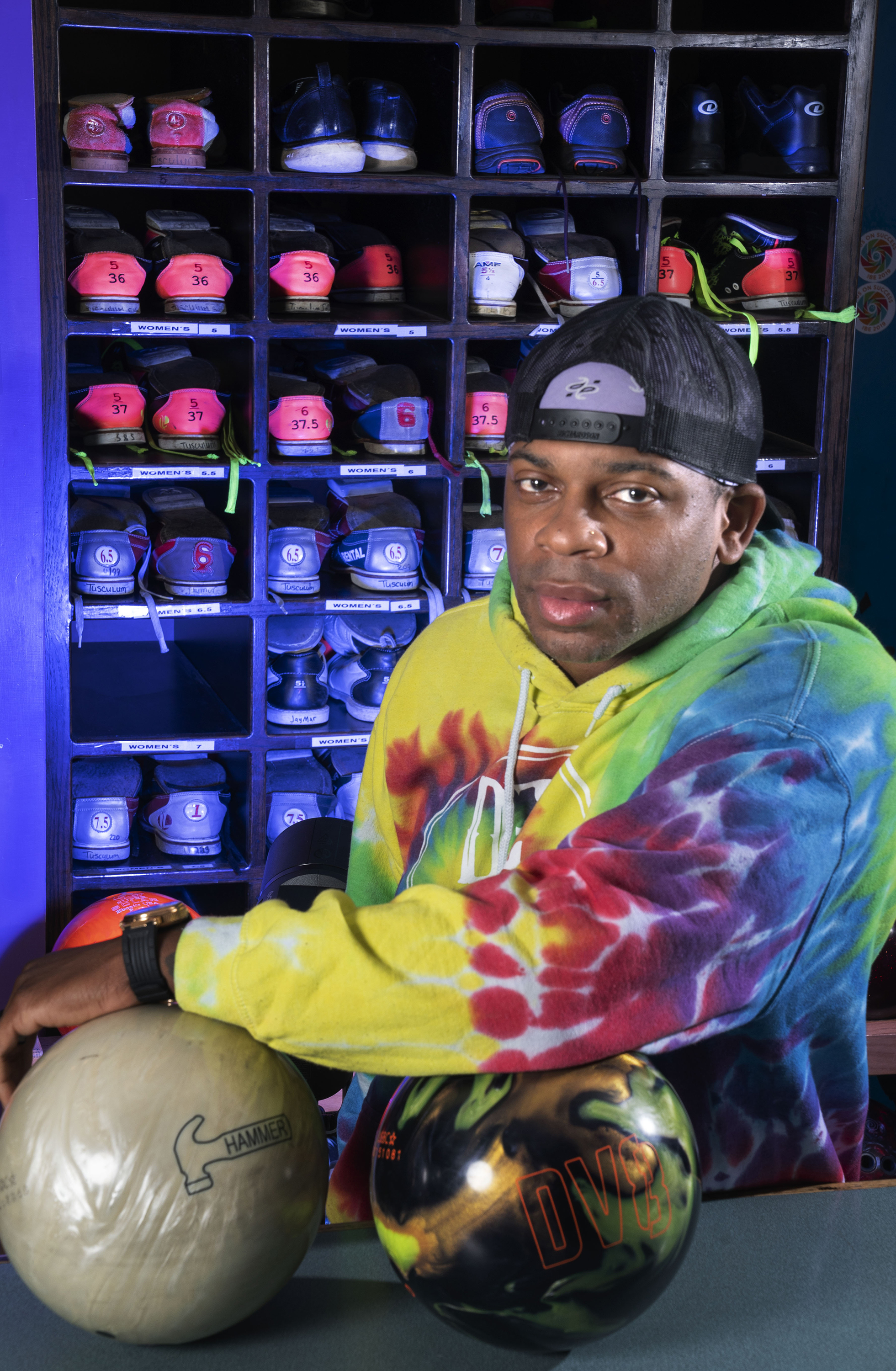 caption: Allen is a regular at his local bowling alley, where he brings the same level of commitment that he does for his music.