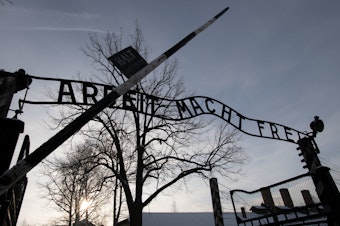 caption: Holocaust survivors visited the former Auschwitz concentration camp on International Holocaust Remembrance Day.