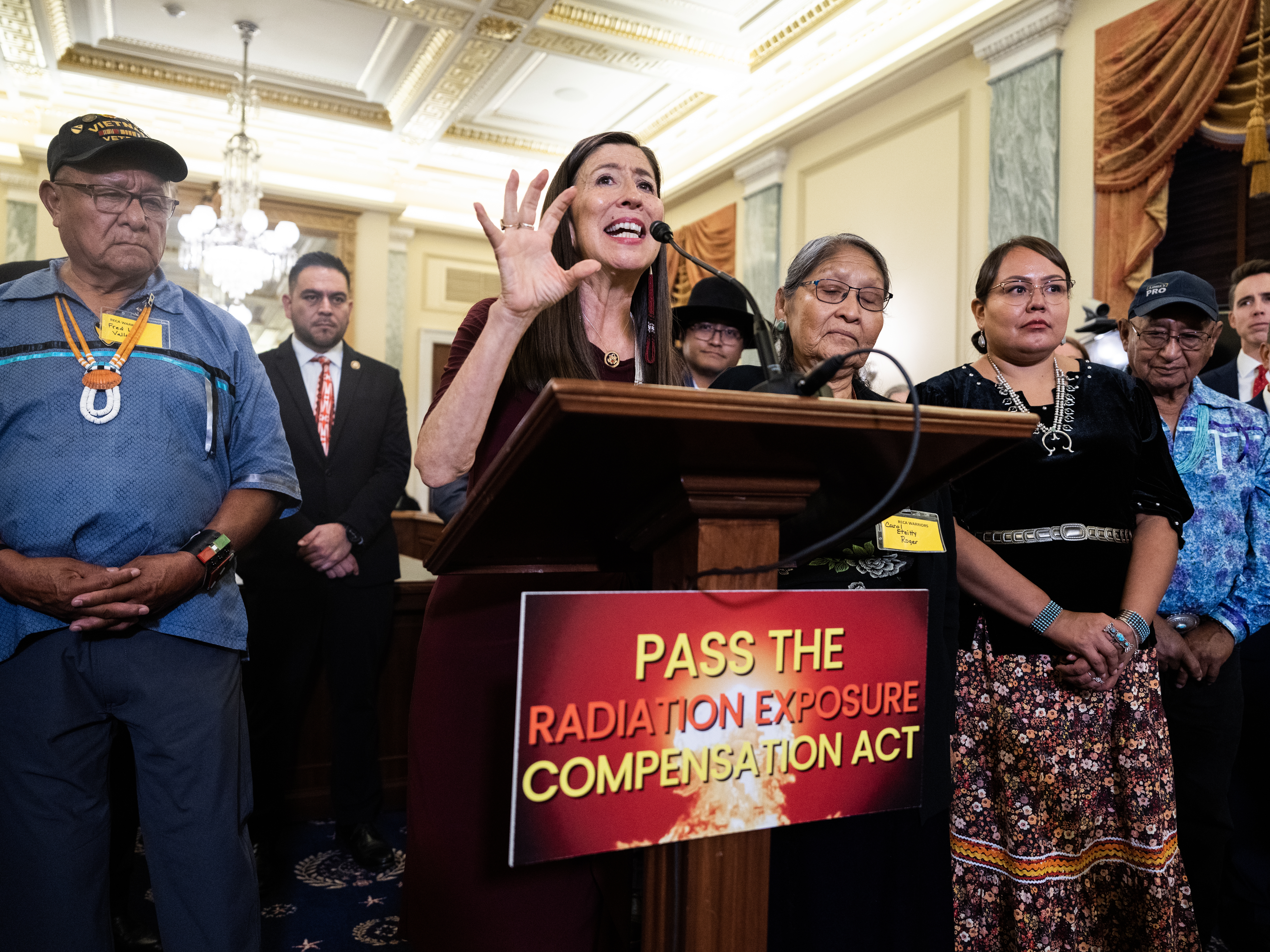 caption: Rep. Teresa Leger Fernandez, D-N.M., speaks in favor of reauthorizing the Radiation Exposure Compensation Act in 2024. The legislation, which will benefit people sickened by radiation exposure in uranium mining and nuclear weapons testing, was included in the budget bill President Trump signed on July 4, 2025.