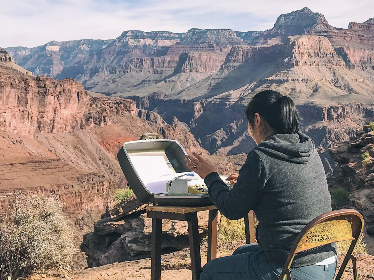 caption: National Park ranger Elyssa Shalla placed a $5 typewriter from Goodwill at Plateau Point in the Grand Canyon and invited hikers to share their thoughts.