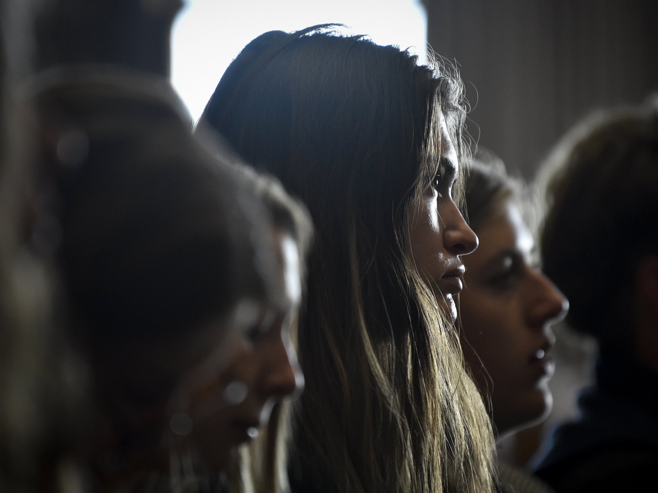caption: Lead plaintiff Rikki Held listens to testimony during a hearing in the climate change lawsuit, Held vs. Montana, at the Lewis and Clark County Courthouse on, June 20, 2023, in Helena, Mont.