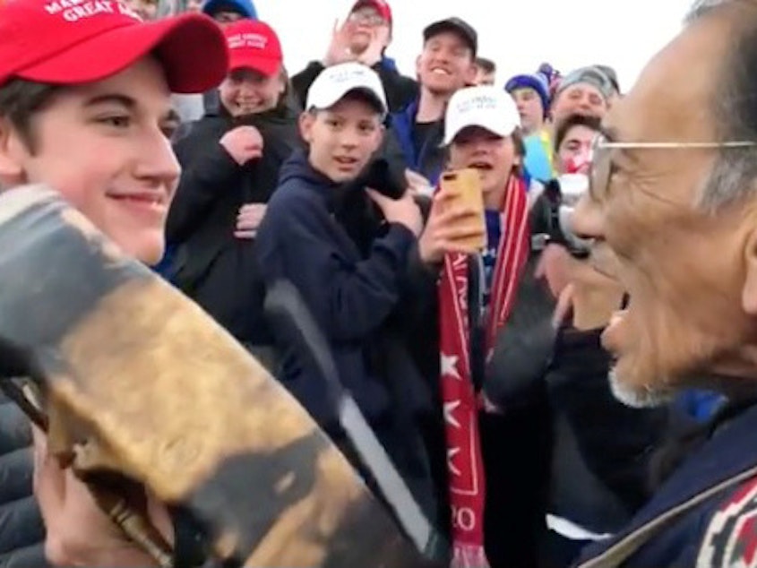 caption: Covington Catholic (Ky.) High School student Nick Sandmann, seen here standing before Native American activist Nathan Phillips at the Lincoln Memorial, says he has received death threats after video of their encounter went viral.