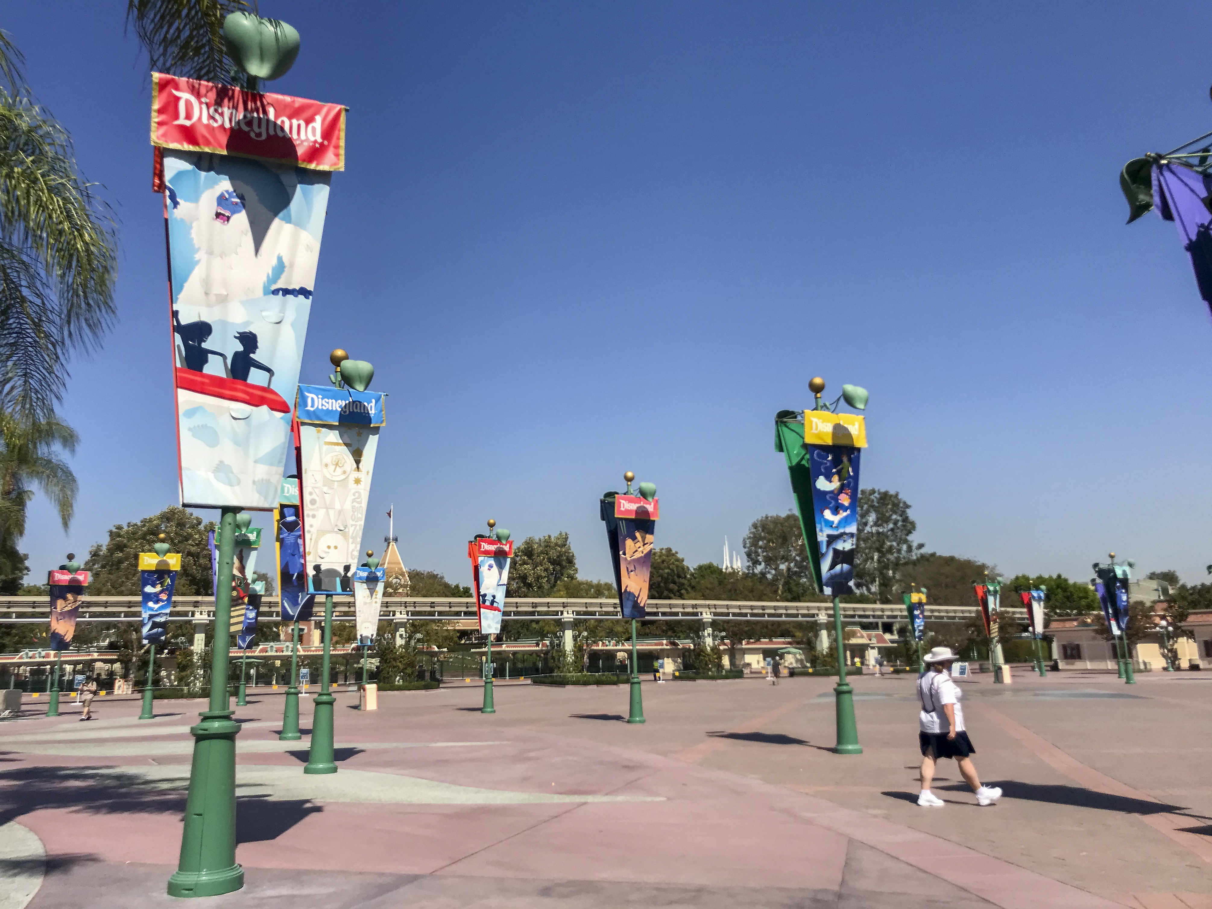 caption: Disneyland Park and California Adventure Park in Anaheim, Calif., will reopen on April 30, after having been closed since last March due to the coronavirus pandemic.