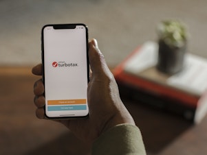 caption: Turbo Tax is displayed on a device on February 22, 2018 in San Francisco, California.