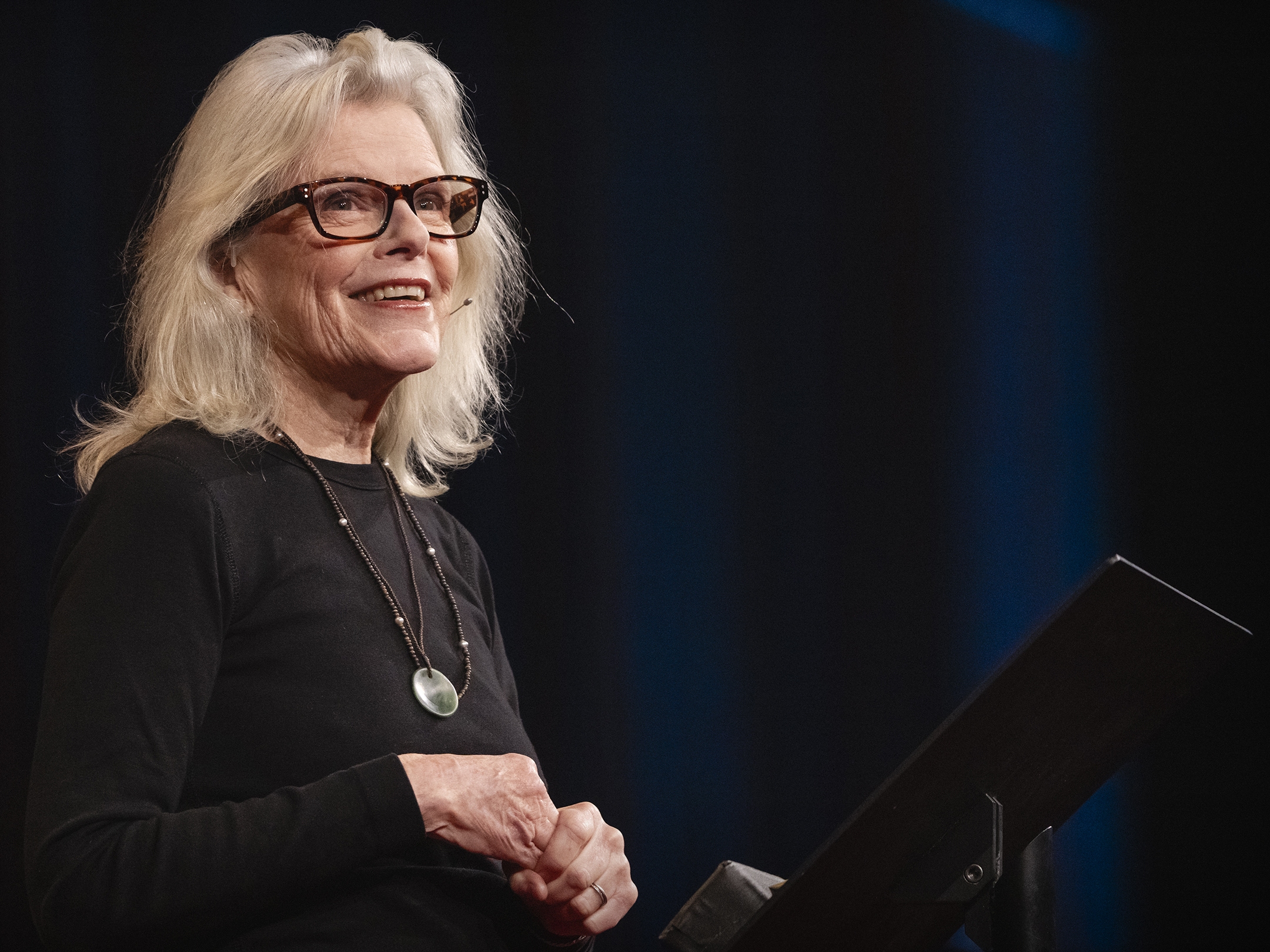 caption: Kristine McDivitt Tompkins speaks at TED2024