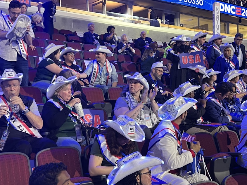 caption: Krystal Marx (center, wearing a keffiyeh), a Washington delegate and former Burien city councilmember, attends the Democratic National Convention in Chicago on Aug. 19, 2024. Marx was possibly the only 'no' vote on the party platform in the Washington delegation. She wanted to see more commitment to a ceasefire in Gaza, and limits on military support for Israel, in the platform.