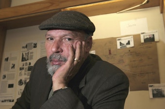 caption: Playwright August Wilson poses at Yale University in New Haven, Conn. on April 7, 2005. 