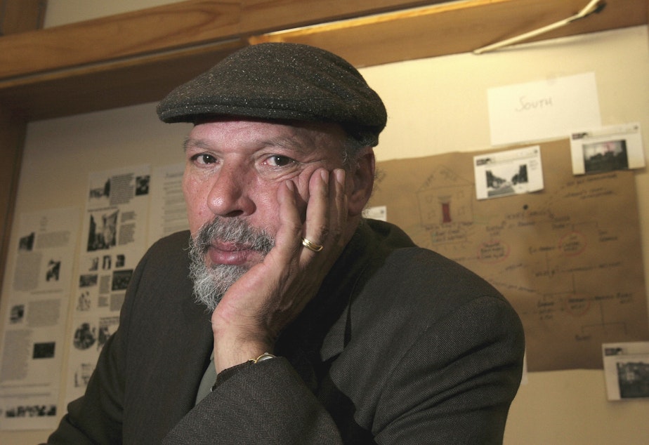 caption: Playwright August Wilson poses at Yale University in New Haven, Conn. on April 7, 2005. 
