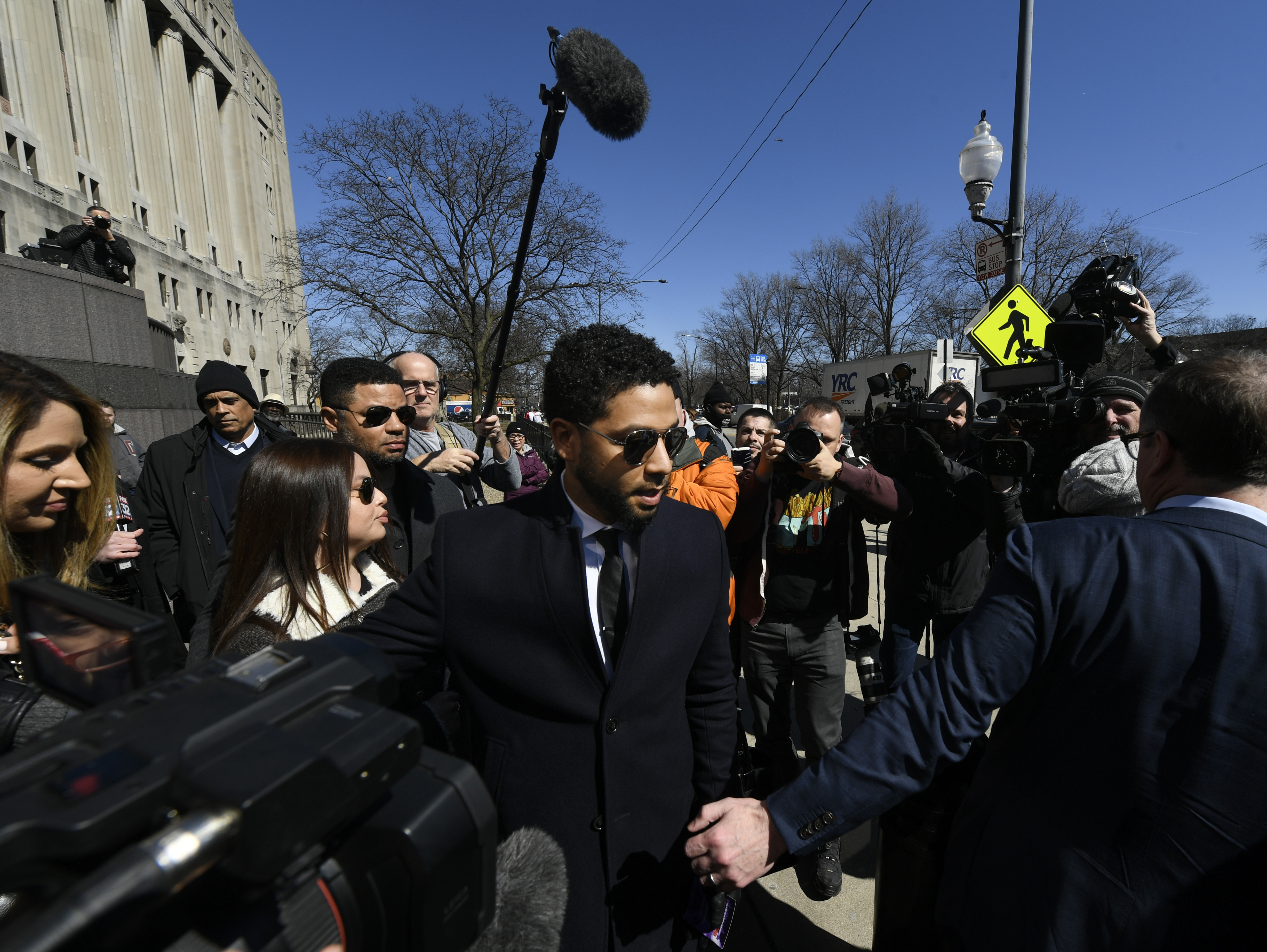 caption: Jussie Smollett leaves a Chicago courthouse Tuesday, shortly after prosecutors dropped all charges against him. The move was met with anger from local authorities and confusion from plenty of onlookers.