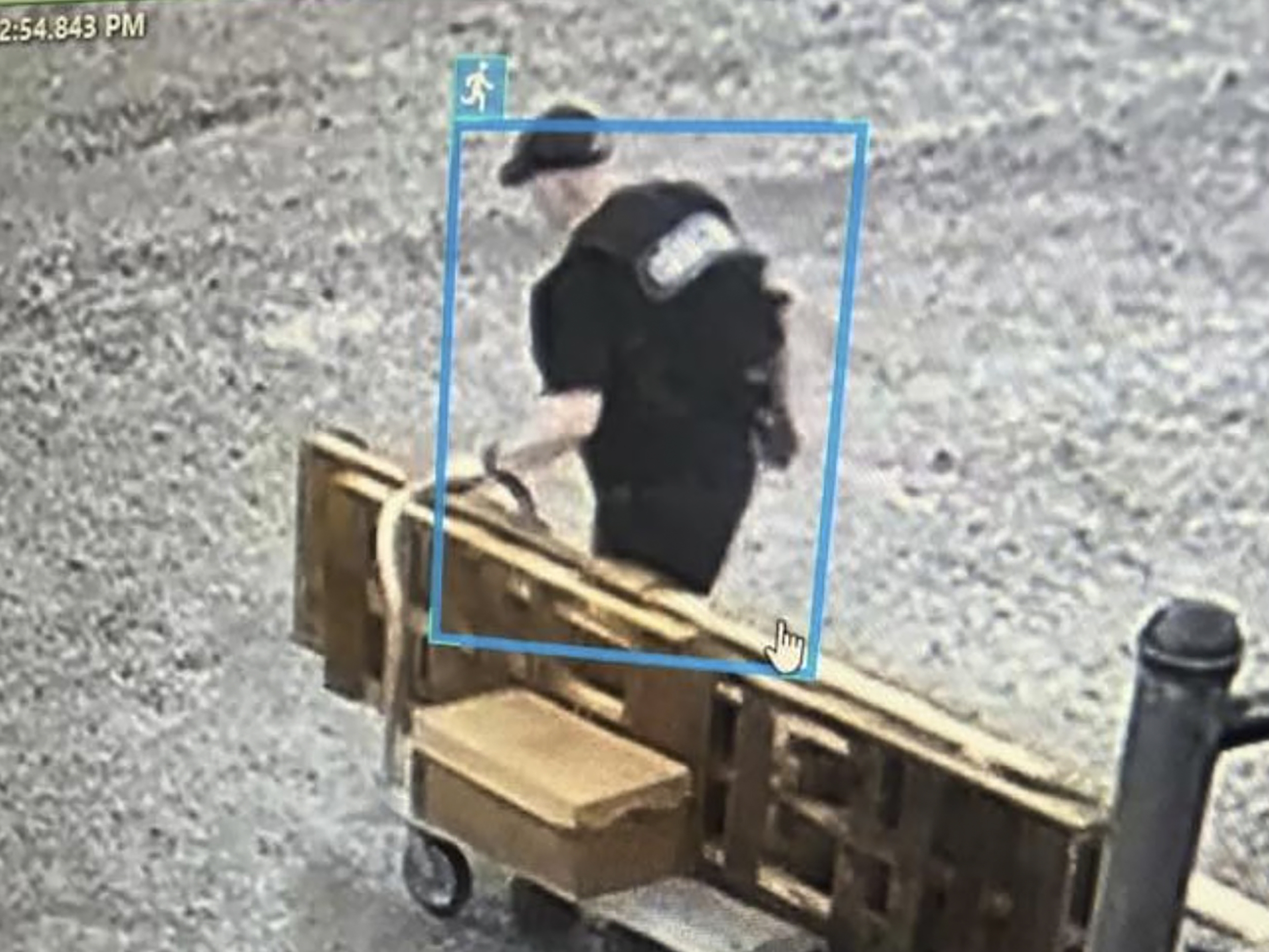 caption: This image provided by the Arkansas Department of Corrections shows Grant Hardin, a former police chief and convicted killer, escaping the North Central Unit prison wearing a disguise in Calico Rock, Ark.