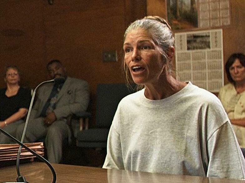caption: Leslie Van Houten is now living in a halfway house in California, after an appeals court upheld her grant of parole. She's seen here speaking to Board of Prison Terms commissioners in 2002.