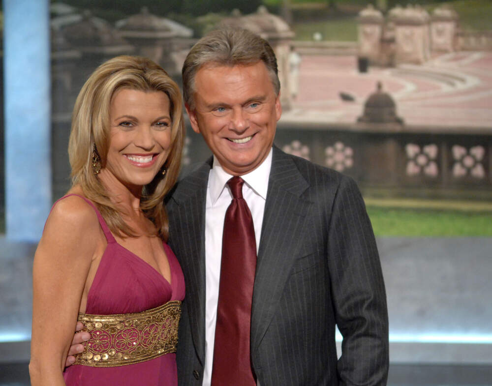 caption: Co-host Vanna White and host Pat Sajak make an appearance at Radio City Music Hall for a taping of celebrity week on "Wheel of Fortune" on Sept. 29, 2007. (Peter Kramer/AP)