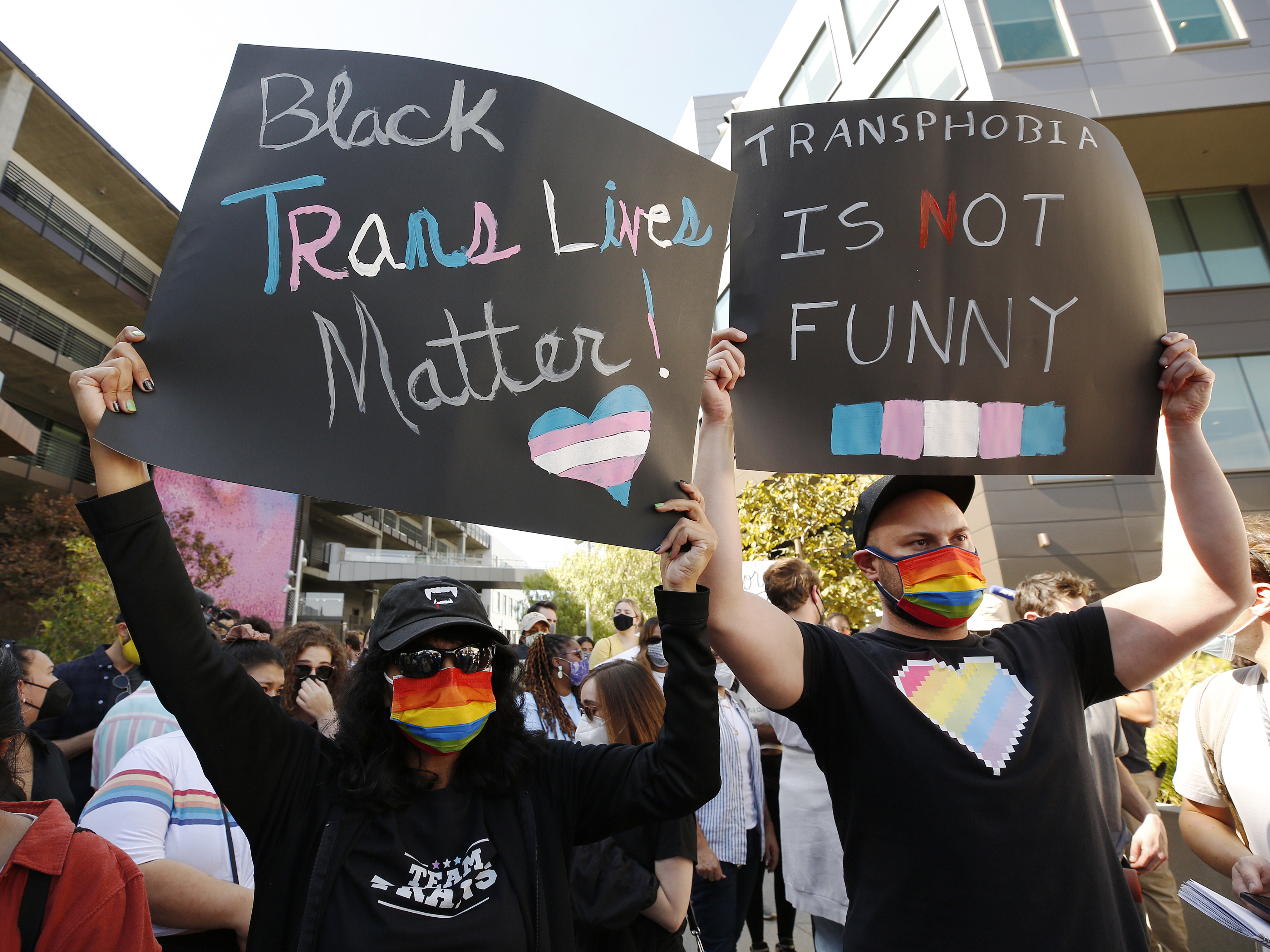 caption: Protesters during an Oct. 20 walkout by Netflix employees, activists, public figures and supporters.