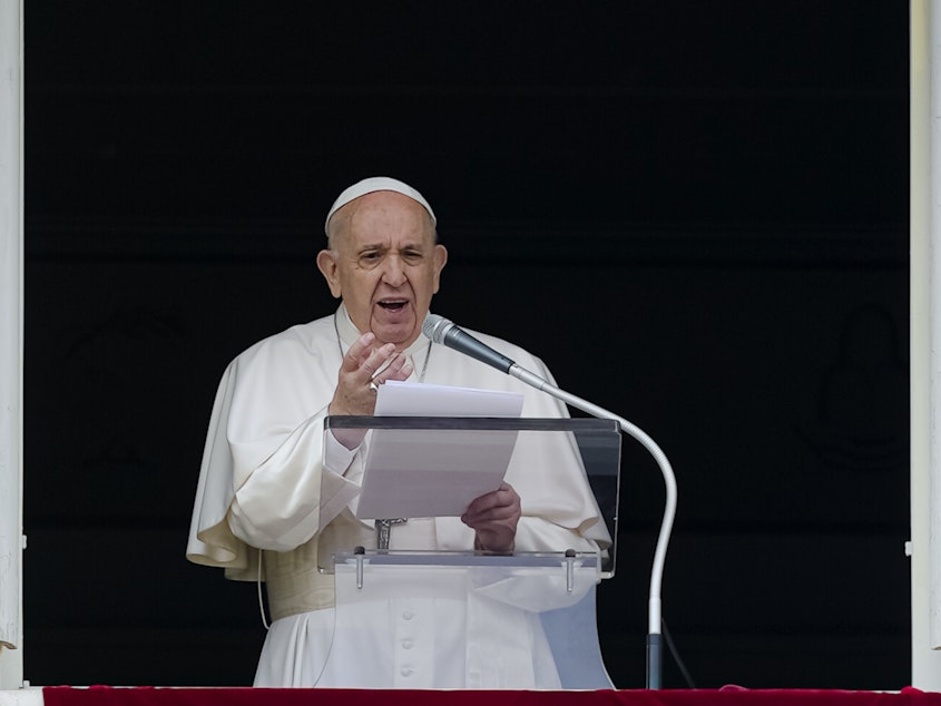 caption: Pope Francis speaks from the window of his studio overlooking St. Peter's Square on Sunday. Francis expressed sorrow for the treatment of Indigenous people in Canada, but did not offer an apology.
