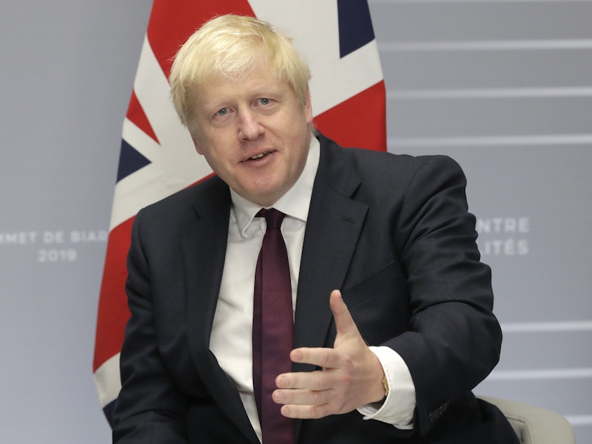 caption: Britain's Prime Minister Boris Johnson has angered opposition lawmakers by asking Queen Elizabeth to suspend Parliament — a move that would allow him more leeway to secure a no-deal Brexit.