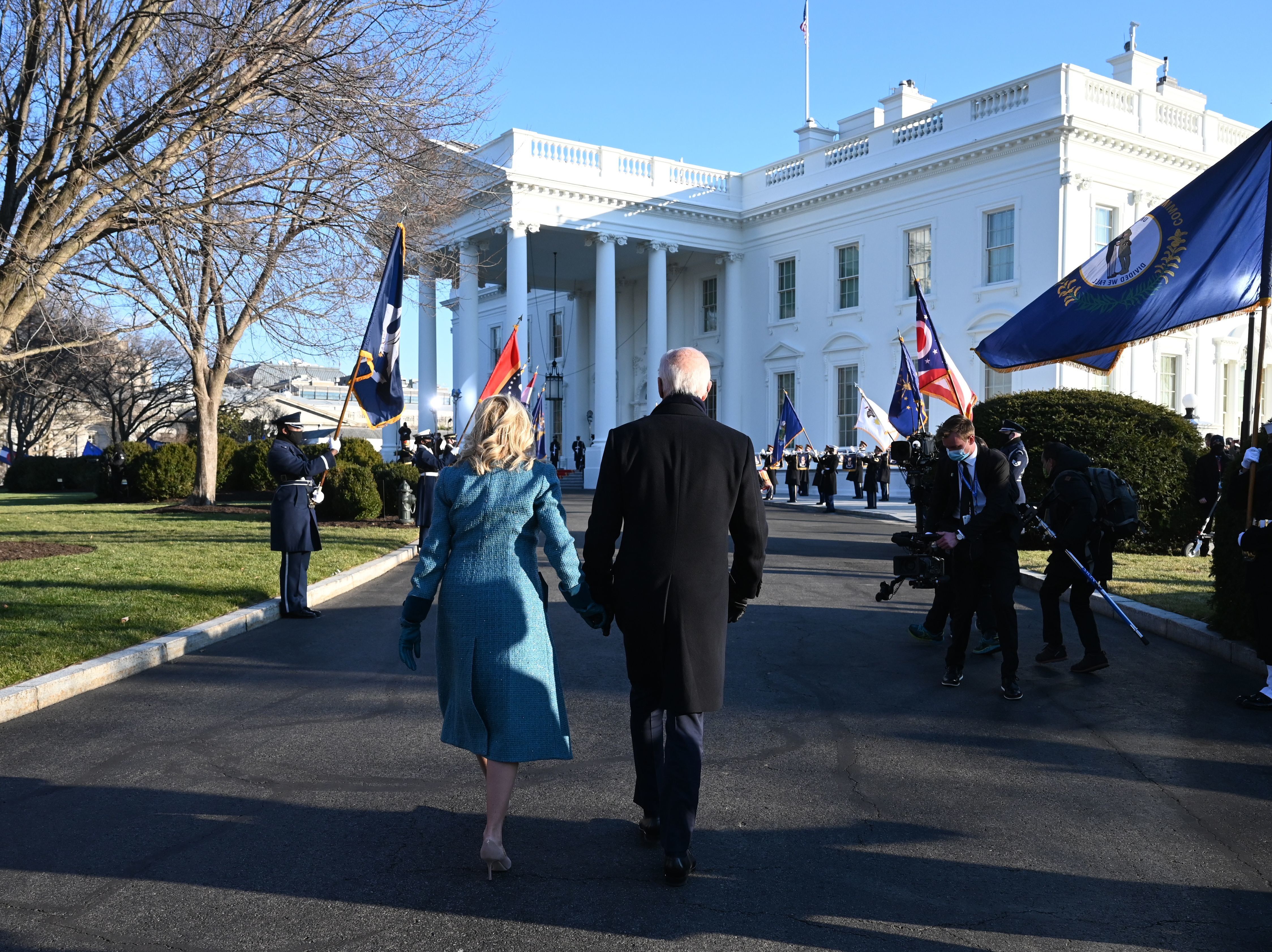 caption: President Joe Biden and first lady Jill Biden arrive at the White House on Wednesday. The Biden administration has made several changes to the White House website with an eye toward inclusivity and accessibility.