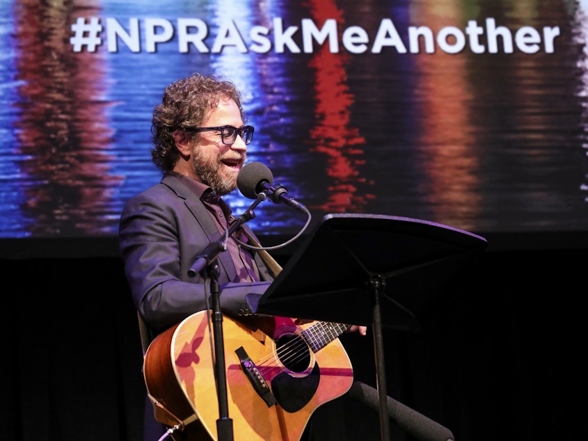 caption: House musician Jonathan Coulton performs a music parody game on <em>Ask Me Another</em> at the Balboa Theatre in San Diego, California.