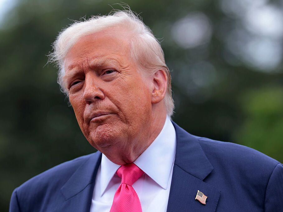 caption: President Donald Trump speaks to the media as he departs the White House on Tuesday.