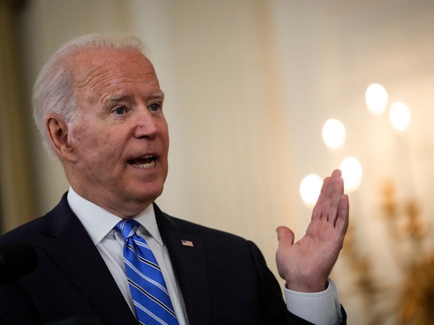 caption: President Biden, pictured on July 19, is set to announce new requirements for federal workers to either get vaccinated or wear masks and get tested regularly.