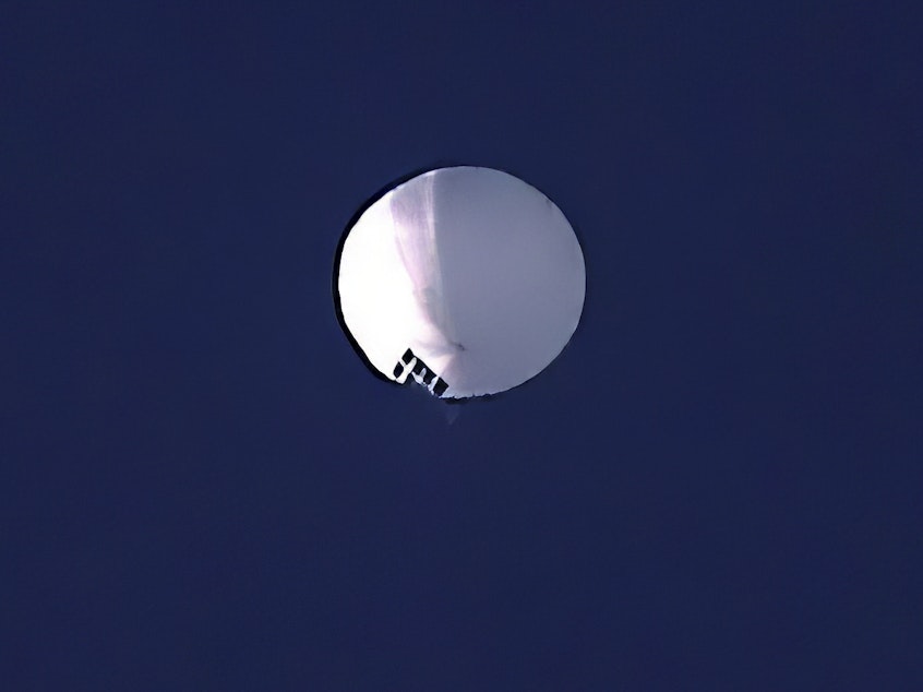 caption: A high altitude balloon floats over Billings, Mont., on Wednesday. The U.S. is tracking a suspected Chinese surveillance balloon that has been spotted over U.S. airspace.