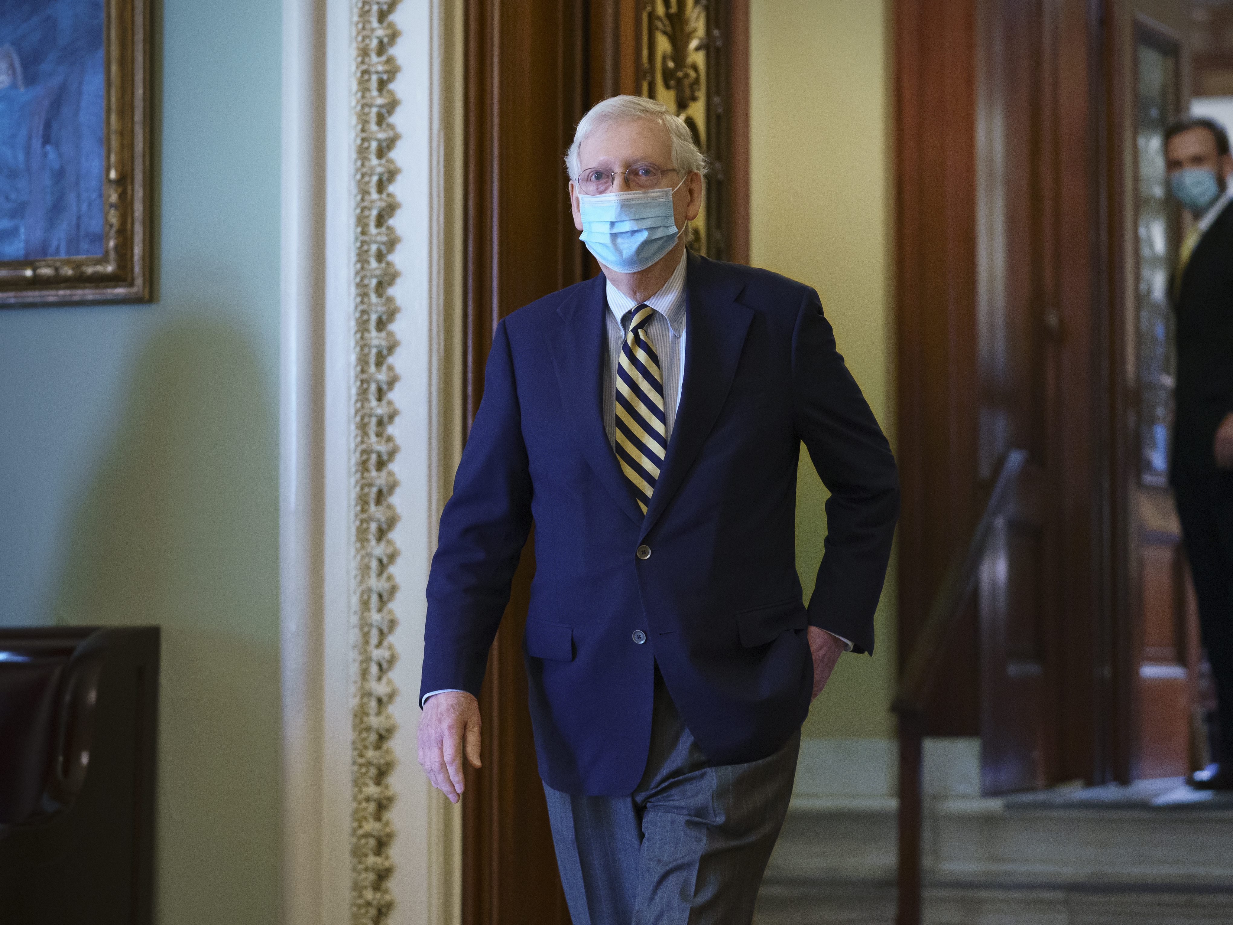 caption: Senate Majority Leader Mitch McConnell, R-Ky., leaves the chamber Monday after speaking about the death of Justice Ruth Bader Ginsburg. McConnell made the case on the Senate floor that voters elected a GOP majority to confirm judicial nominees.