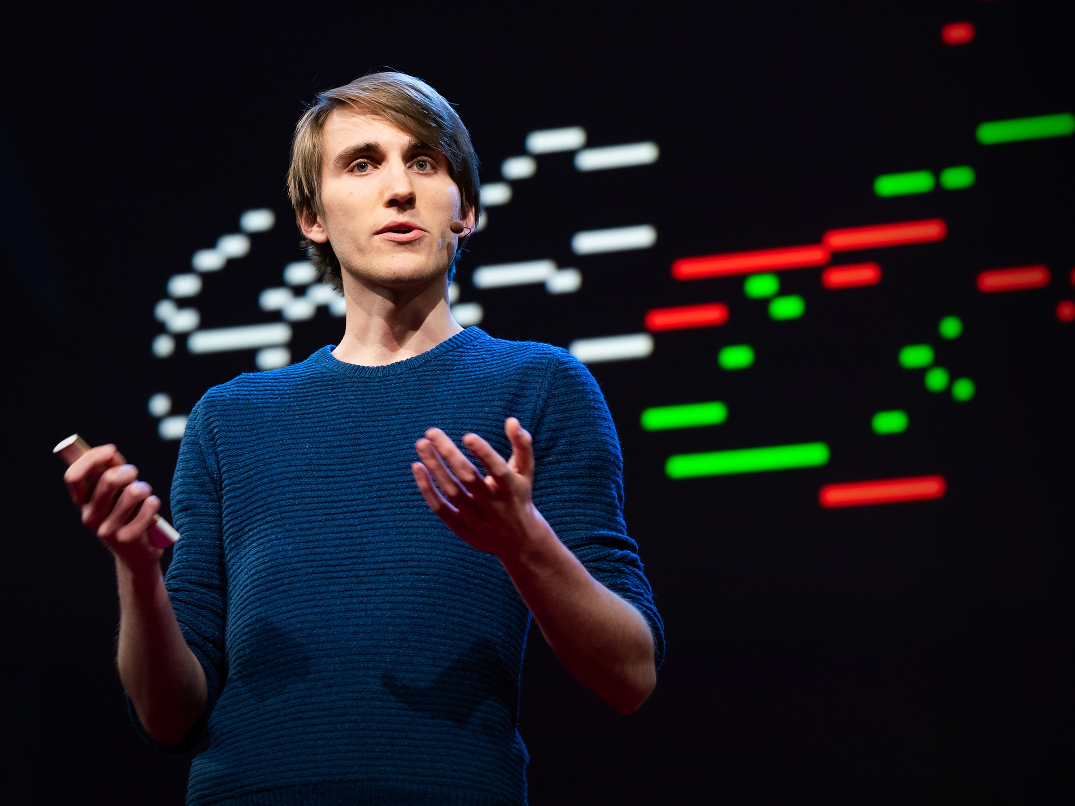 caption: Pierre Barreau speaks at TED2018