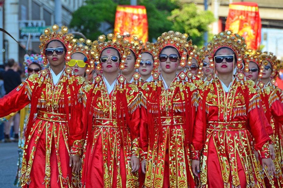 caption: The Seattle Chinese Girls Drill Team at the Chinatown Parade in 2011.
