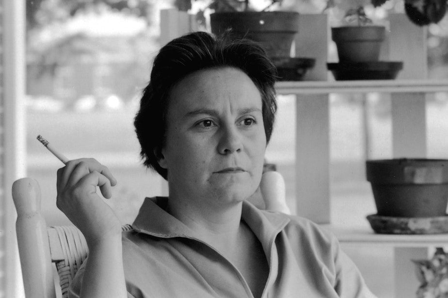 caption: Harper Lee, author of To Kill a Mockingbird, around 1962. The sequel to her book is due out in July.