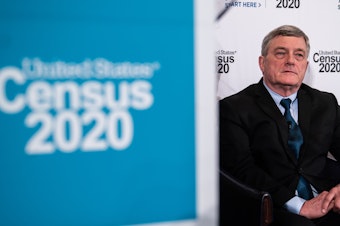 caption: Census Bureau Director Steven Dillingham appears at a 2020 census event in April 2019. He says despite concerns, the bureau is on track to carry out the first primarily online U.S. census with enough workers.