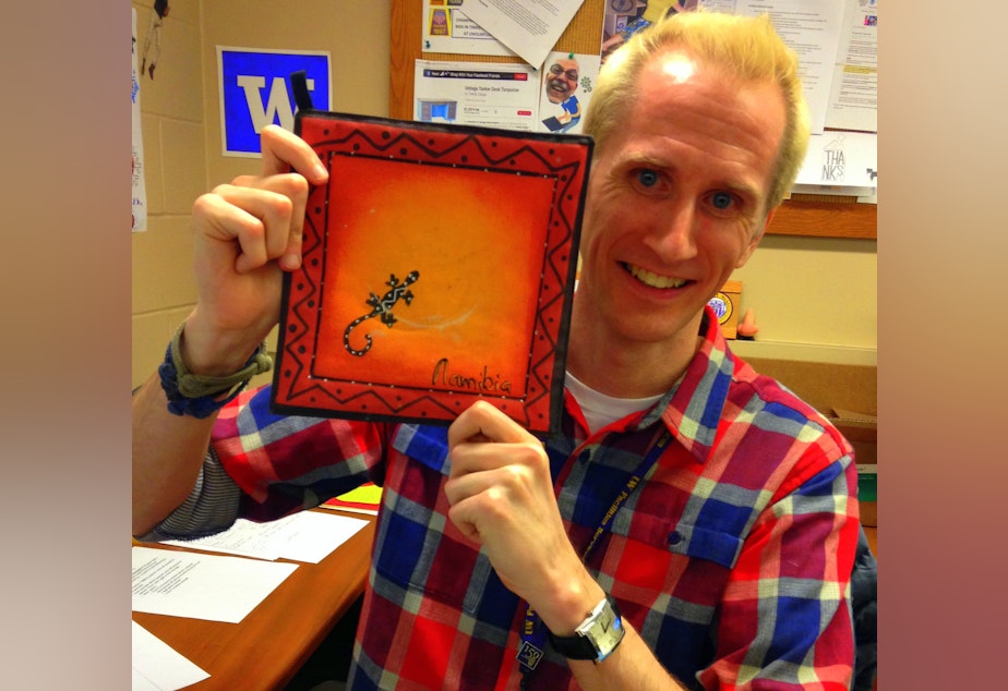 caption: Eric Wahl with a potholder from Namibia