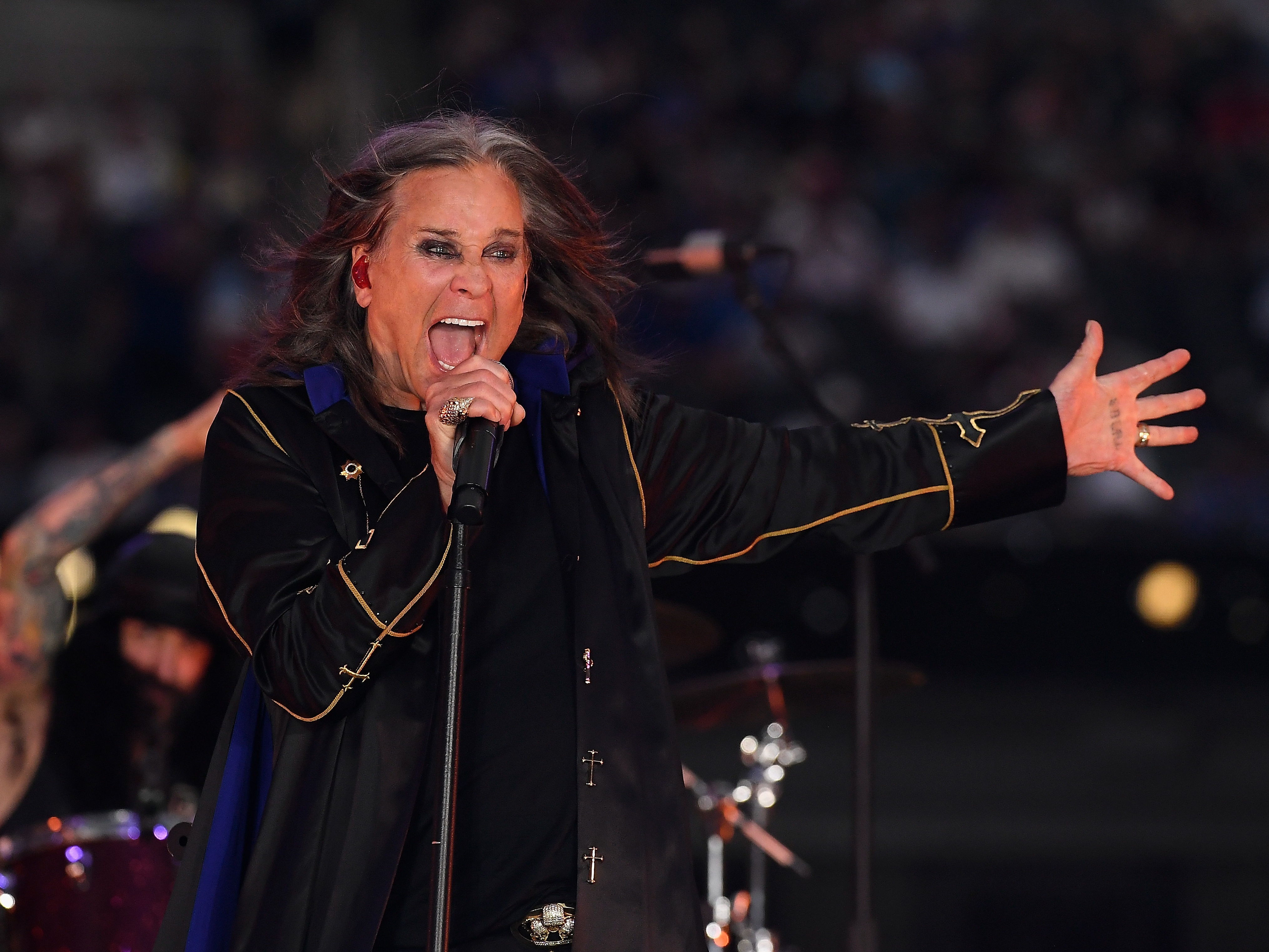 caption: Musician Ozzy Osbourne performs during half-time of the NFL game between the Los Angeles Rams and the Buffalo Bills at SoFi Stadium on September 08, 2022 in Inglewood, California.