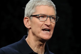 caption: Apple CEO Tim Cook speaks during the 2018 Apple Worldwide Developer Conference (WWDC) at the San Jose Convention Center.