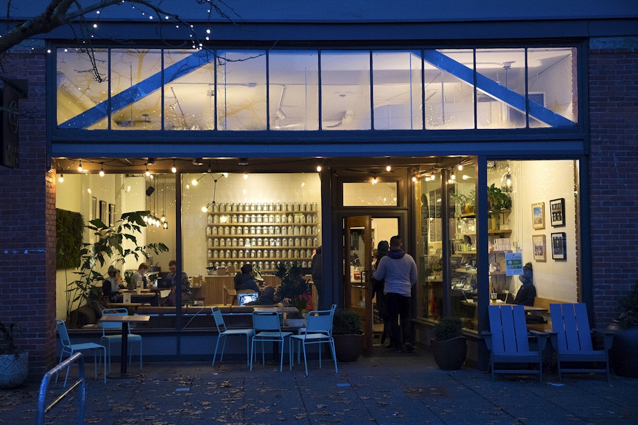 caption: Customers enter Miro Tea on Sunday, November 15, 2020, along Ballard Avenue Northwest in Seattle. New statewide restrictions were announced by Gov. Jay Inslee on Sunday to curb the rapid spread of Covid-19. 