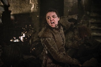 caption: This image released by HBO shows Maisie Williams in a scene from "Game of Thrones," that aired Sunday, April 28, 2019. In the Associated Press' weekly "Wealth of Westeros" series, we're following the HBO fantasy show's latest plot twists and analyzing the economic and business forces driving the story. This week, Arya’s triumphant assassination of the king ice zombie has prompted an appreciation among us for the role of skills, in economics as well as medieval Westeros. 
